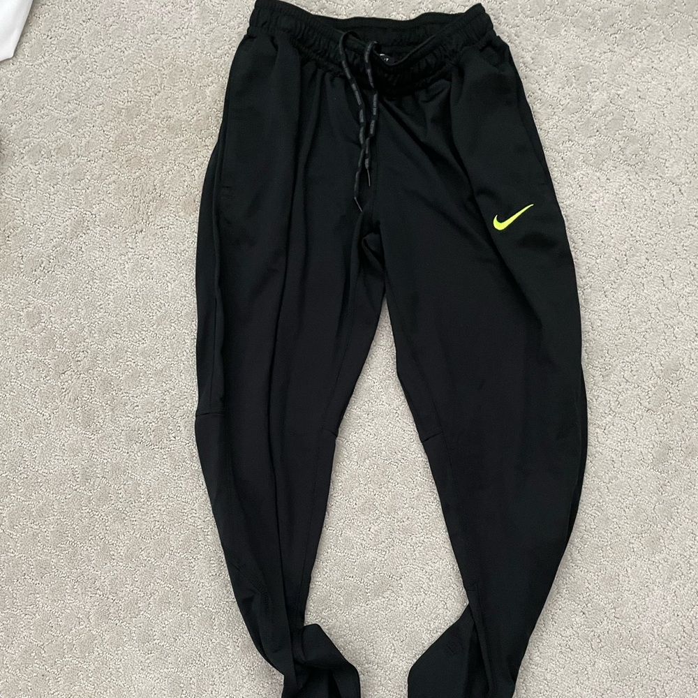 Black size small Nike soccer pants